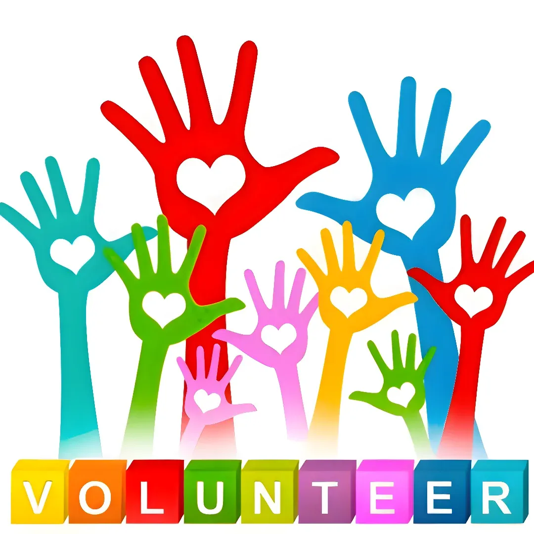 A group of colorful hands with the word "Volunteer" written on them against a white background. The hands are arranged in a circle, with the text at the bottom of the image. The colors of the hands range from bright red to deep blue, creating a vibrant and cheerful atmosphere.